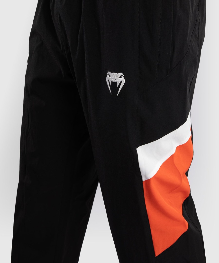 teplákové kalhoty venum x dtr fight attack 90 - černo-oranžové